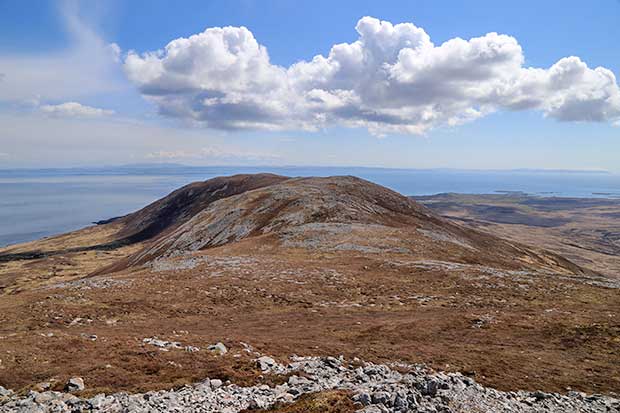 View over the Beinn Bheigeir ridge from the top with Northern Ireland on the horizon